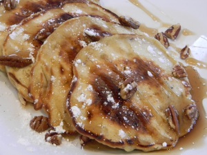 Pecan pancakes with maple syrup